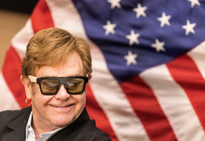 Elton John e...